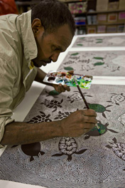 Billy Missi working on his print