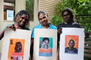 Photo: Gurmarrwuy Yunupingu, Rebecca Munuyngu Marika and Gunariny Wanambi with their prints 